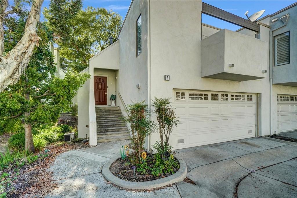166 N Singingwood Street 3, Orange CA 92869 - photo 1