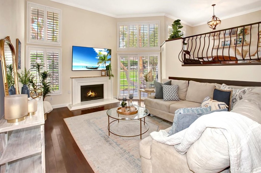 Open Living Room-Valuted Ceilings - 166 N Singingwood Street 9, Orange CA 92869 - photo 1