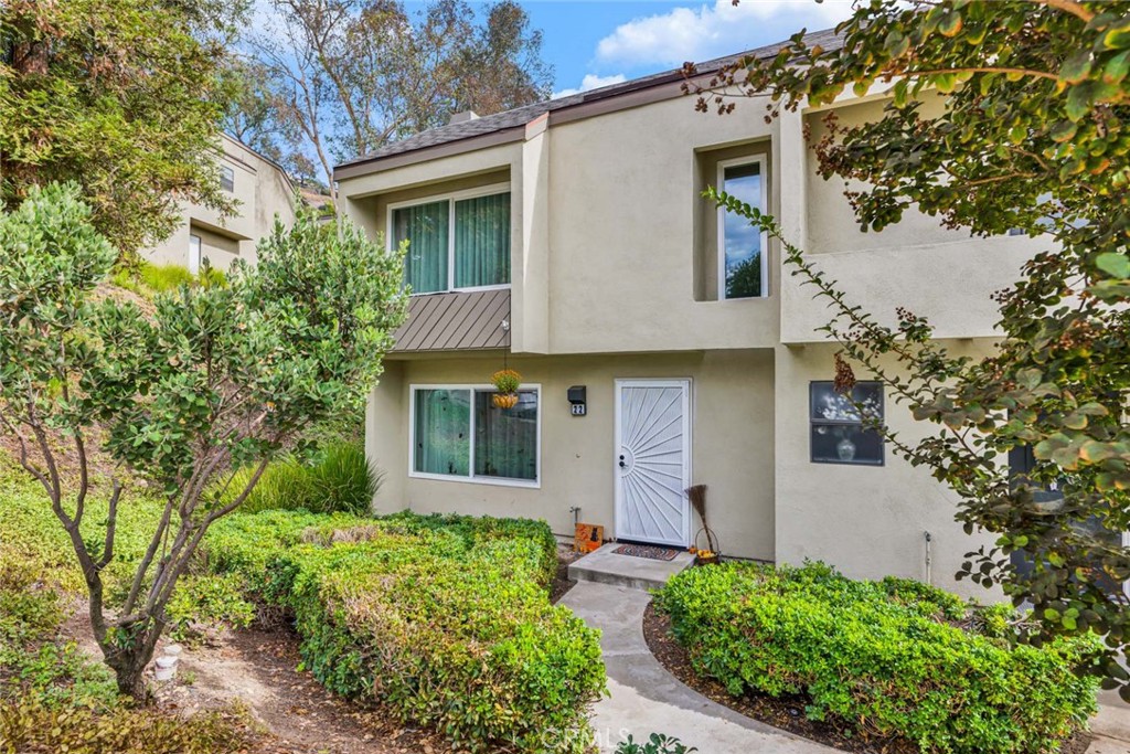 Located in the Villeurbanne Community! - 177 N Singingwood Street 22, Orange CA 92869 - photo 1