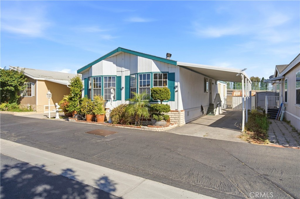 front exterior & covered carport - 1925 E La Veta Avenue 49, Orange CA 92866 - photo 2