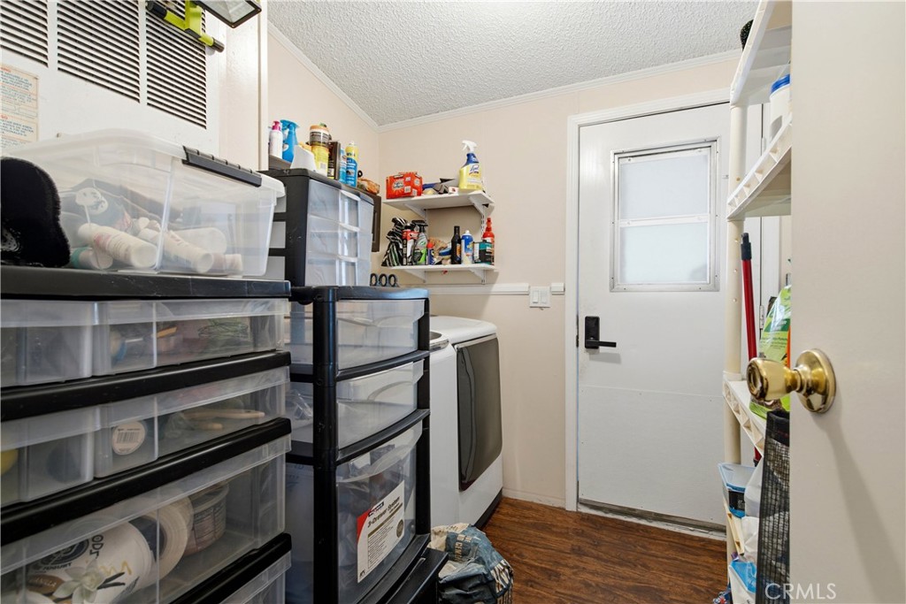 interior Side hallway & Laundry - 1925 E La Veta Avenue 49, Orange CA 92866 - photo 22