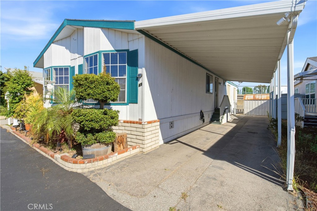 exterior Carport & side Entry - 1925 E La Veta Avenue 49, Orange CA 92866 - photo 42
