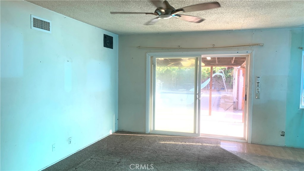 Living Room Sliding Door Leading to Backyard - 20192 E Santiago Canyon, Orange CA 92869 - photo 8