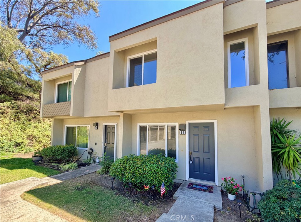 245 N Singingwood Street 11, Orange CA 92869 - photo 1