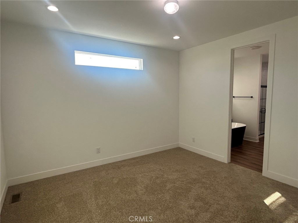 Bedroom 1 - 300 N Rampart 11, Orange CA 92868 - photo 13