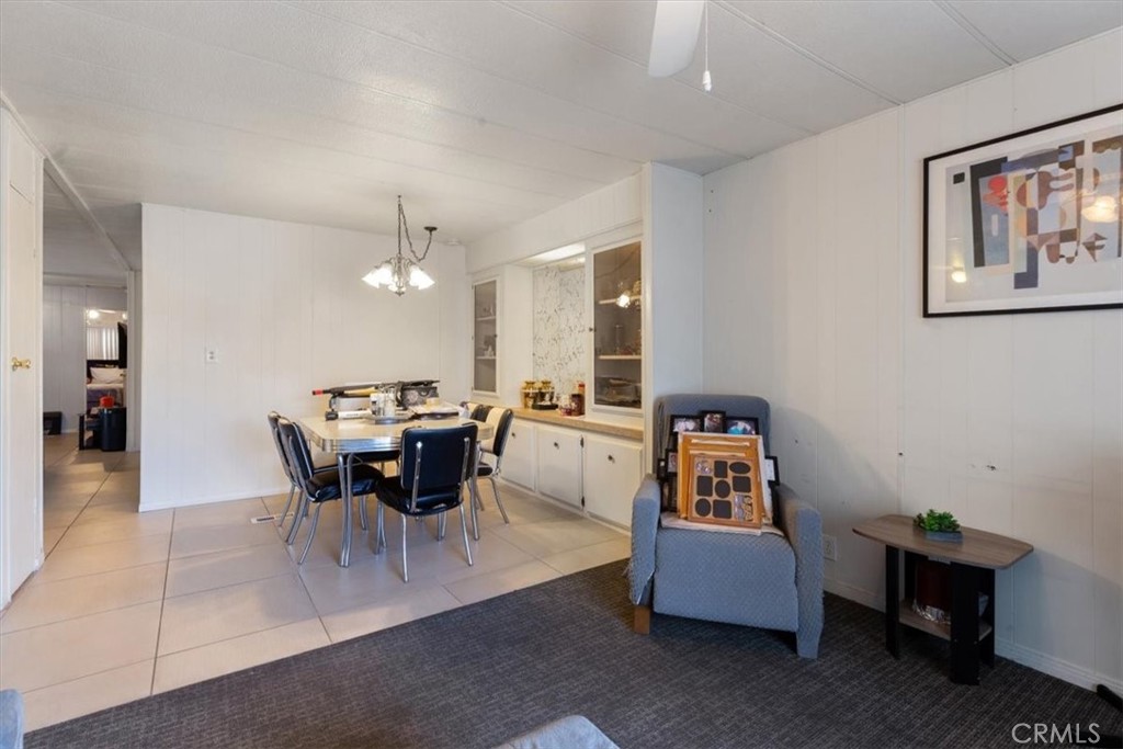 Dining Area with Open Floor Plan - 300 N Rampart 195, Orange CA 92868 - photo 7