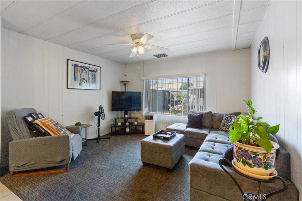Spacious Living Room with Natural Light - 300 N Rampart 195, Orange CA 92868 - photo 10