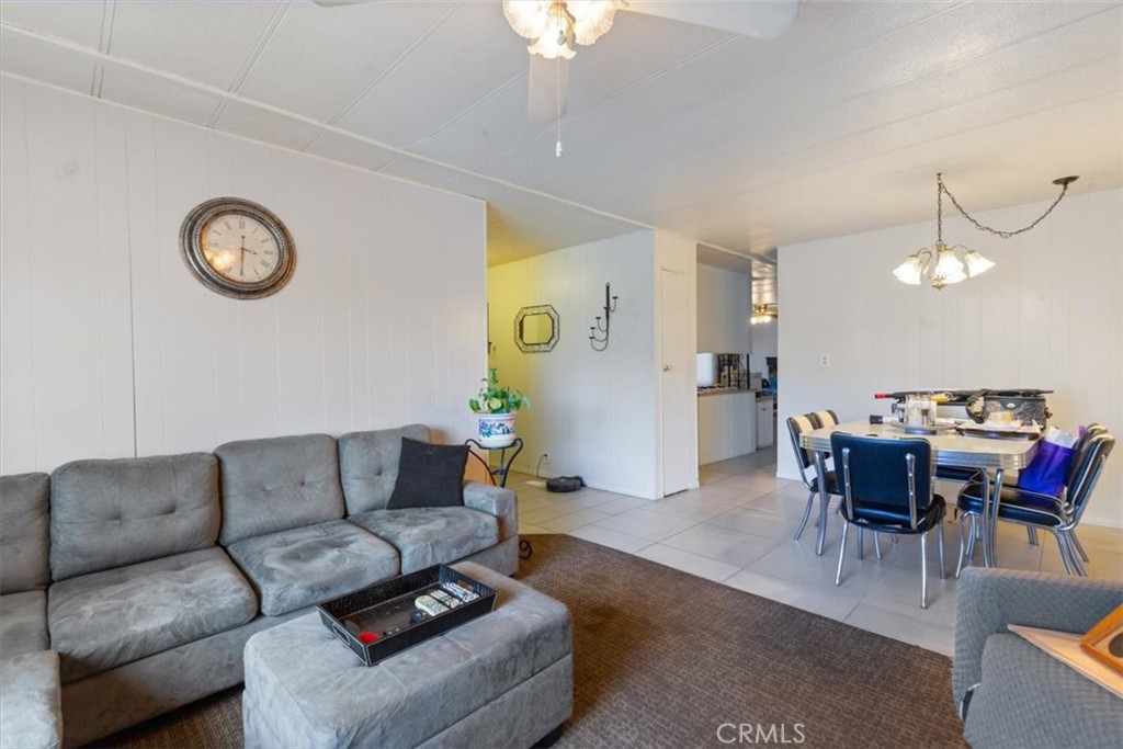 Spacious Living Room with Natural Light - 300 N Rampart 195, Orange CA 92868 - photo 11