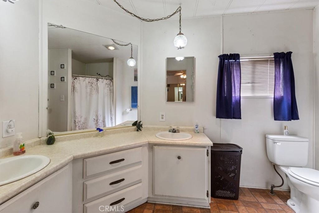 Second Bathroom with Dual Vanity - 300 N Rampart 195, Orange CA 92868 - photo 17