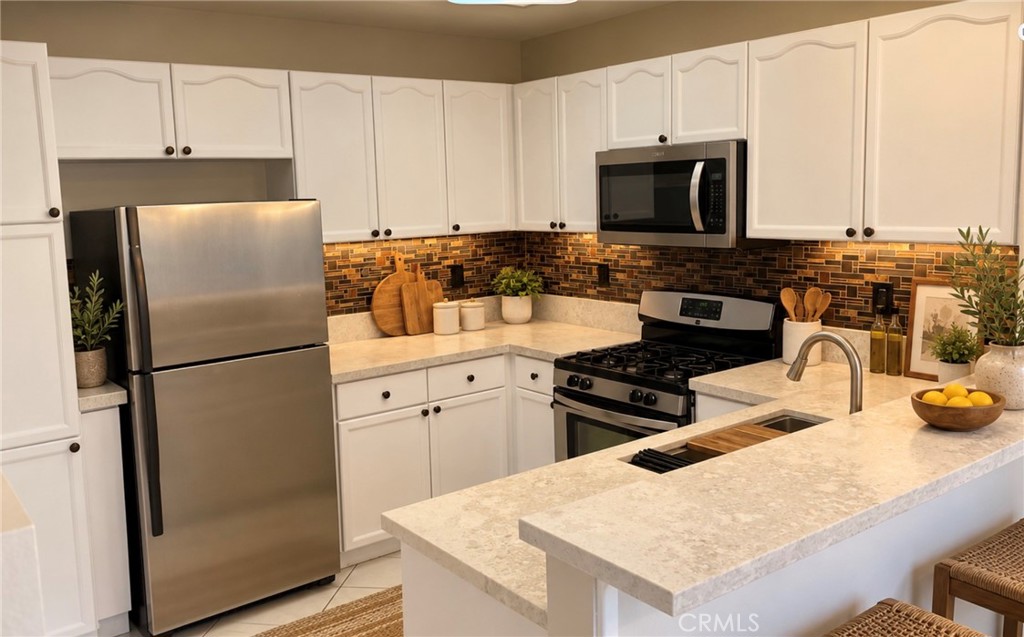 Kitchen AI staged - 3317 Metcalf E E, Orange CA 92869 - photo 3