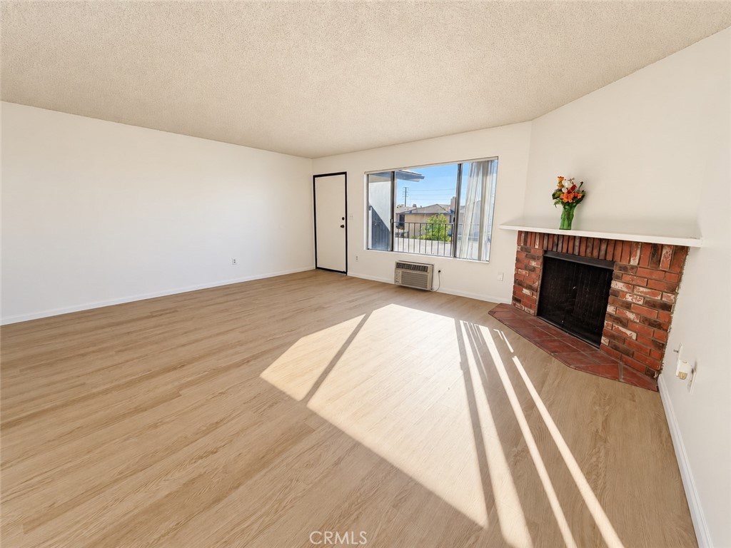 Living Room Fireplace - 338 E Meats Avenue C, Orange CA 92865 - photo 5