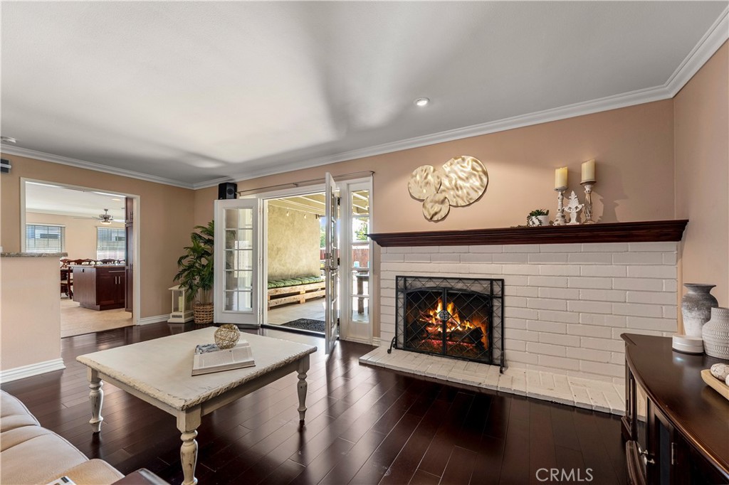 Fantastic living room open to backyard patio and kitchen. - 390 N Milford Road, Orange CA 92867 - photo 3