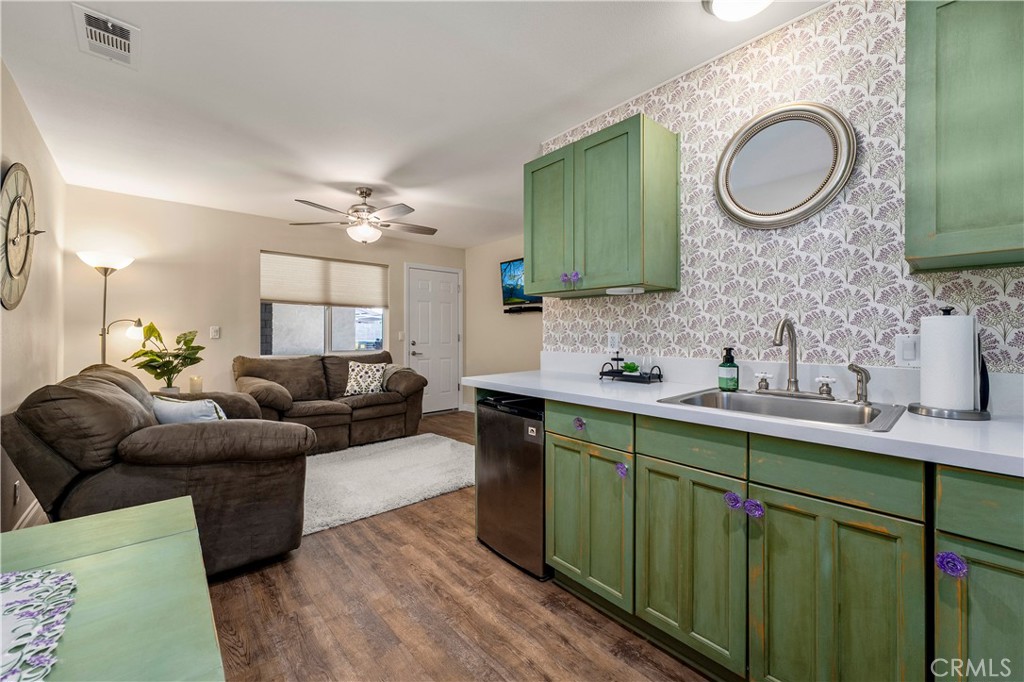 ADU- Home has a custom ADU with its own entrance. One entrance is on side yard where they don't even have to come throug - 390 N Milford Road, Orange CA 92867 - photo 7