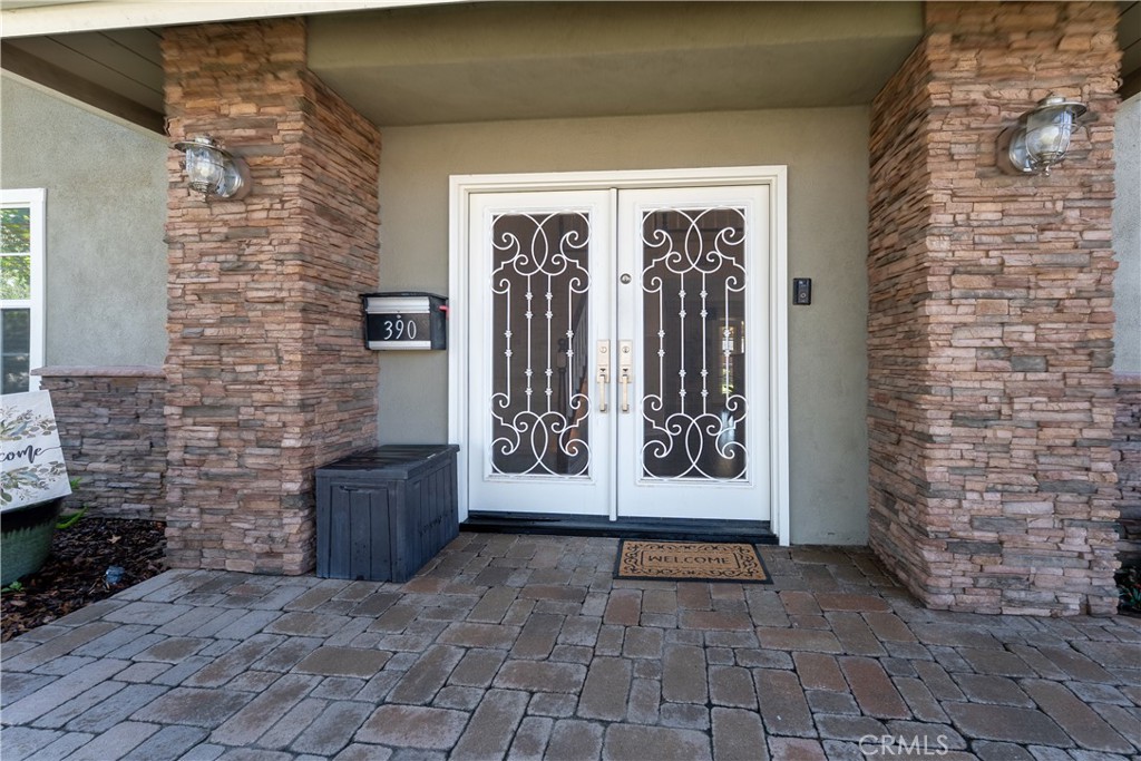 Custom solid steel front entry doors with glass that opens for fresh air. - 390 N Milford Road, Orange CA 92867 - photo 8