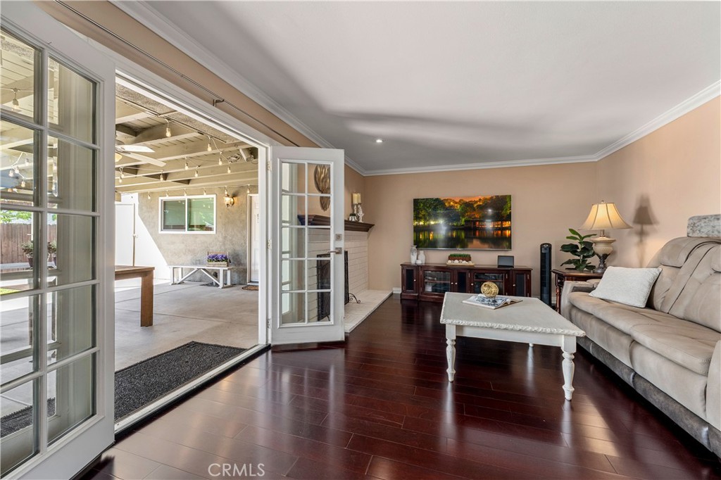 French double doors that lead to covered patio and backyard and ADU. - 390 N Milford Road, Orange CA 92867 - photo 10
