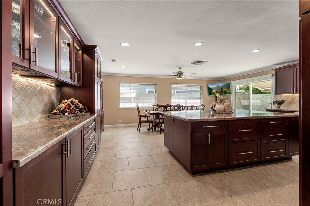 Massive kitchen island in this oversize kitchen. - 390 N Milford Road, Orange CA 92867 - photo 15