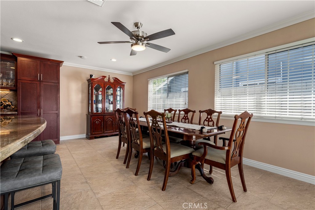 This kitchen could easily accommodate for a 12 person dining table. - 390 N Milford Road, Orange CA 92867 - photo 21