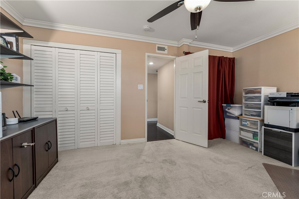 Another shot of downstairs bedroom/office with 2 closets. - 390 N Milford Road, Orange CA 92867 - photo 27
