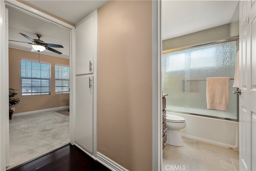 Downstairs full bathroom outside of bedroom/office. - 390 N Milford Road, Orange CA 92867 - photo 28