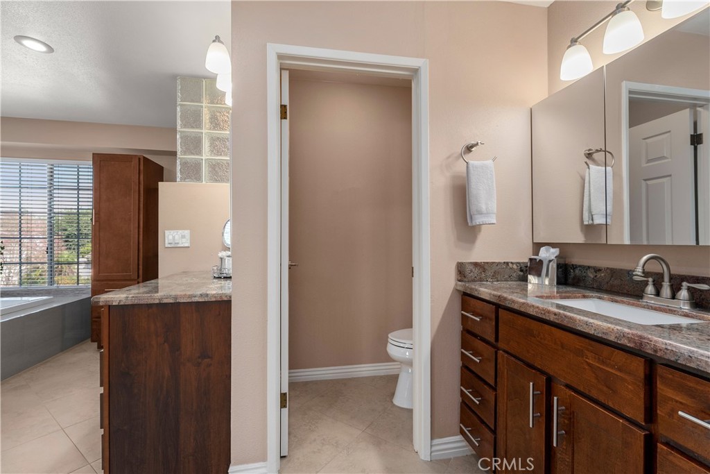 Upstairs primary en suite bathroom. - 390 N Milford Road, Orange CA 92867 - photo 33