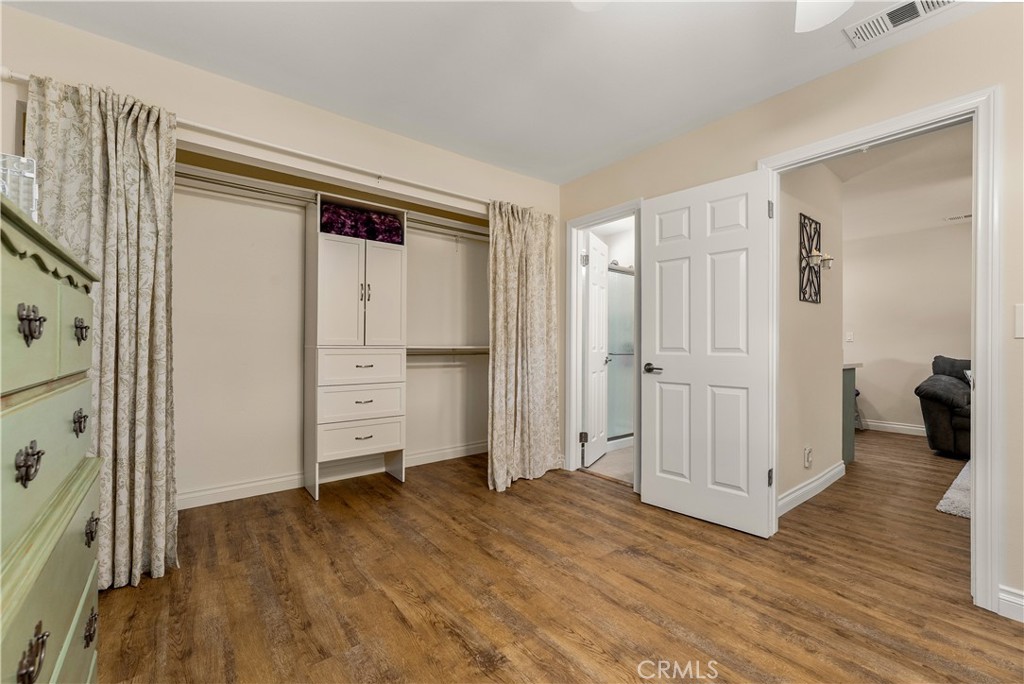 ADU primary bedroom with en suite bathroom. - 390 N Milford Road, Orange CA 92867 - photo 46