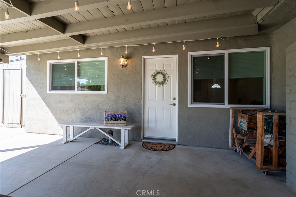 This photo as of the second entry door to the ADU, which is underneath the patio cover. - 390 N Milford Road, Orange CA 92867 - photo 49