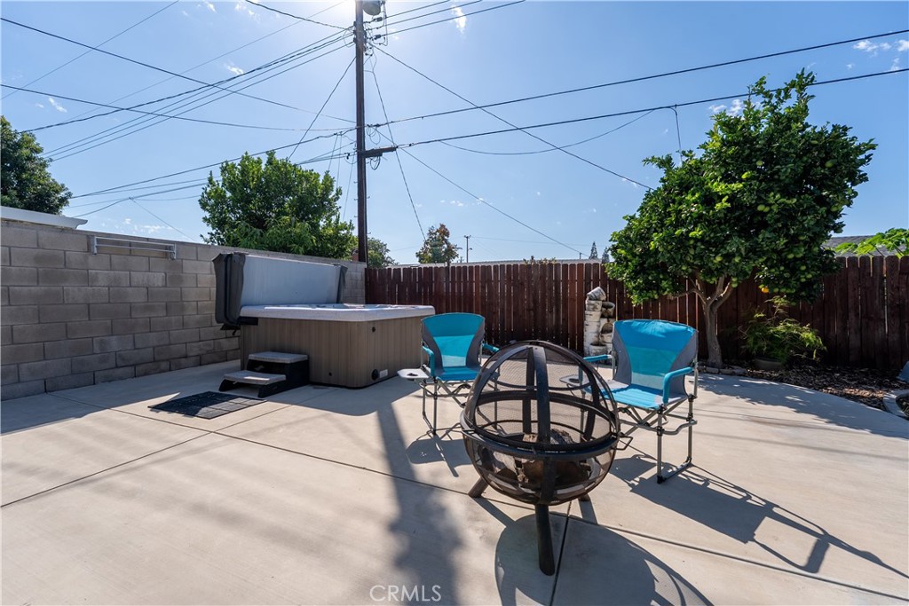 Relaxing Spa on large patio with room for barbecuing, sitting around the fire and enjoying the Orange County lifestyle. - 390 N Milford Road, Orange CA 92867 - photo 51