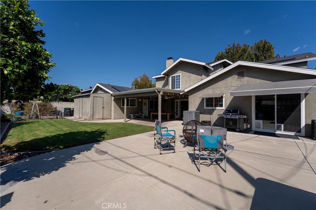 The shot shows you the patio door, which is off the kitchen out to the backyard. - 390 N Milford Road, Orange CA 92867 - photo 54