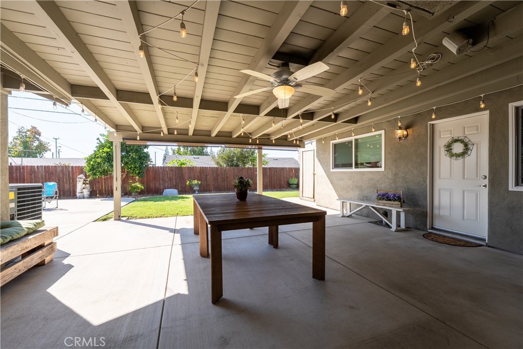 Outdoor covered patio area in addition to 2nd entry to the​​‌​​​​‌​​‌‌​​‌‌​​‌‌​​‌​​​‌‌​‌​​​​‌‌​‌​​ ADU. - 390 N Milford Road, Orange CA 92867 - photo 55