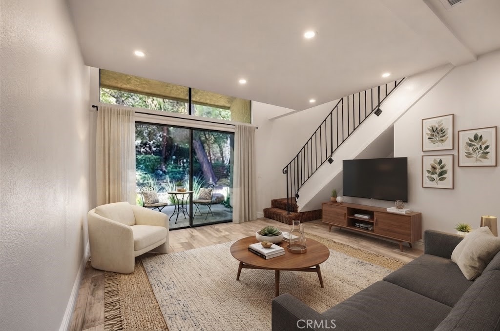Digitally enhanced, virtually staged - living room - 4900 E Chapman Ave, #23, Orange CA 92869 - photo 1