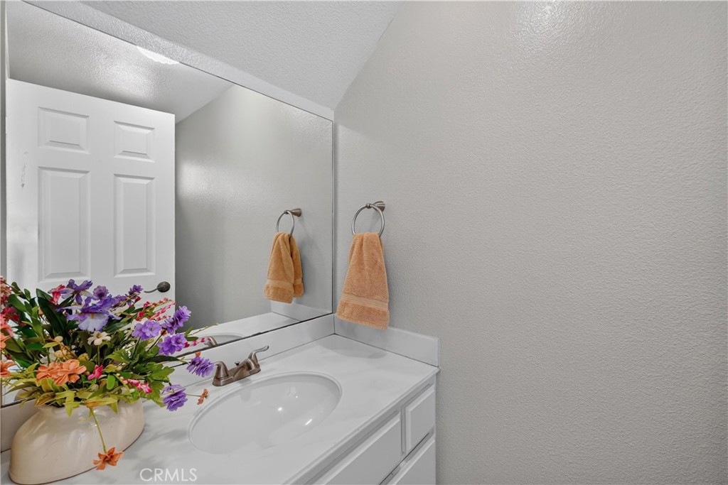Downstairs 1/2 Bath - 5037 E Almond Avenue 5, Orange CA 92869 - photo 22