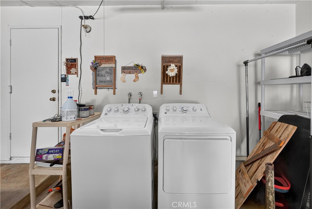 Laundry in attatched garage - 5037 E Almond Avenue 5, Orange CA 92869 - photo 37