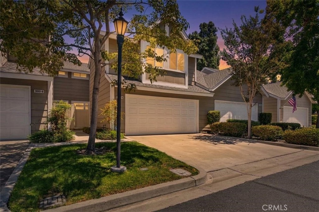 Front of Home Twilight - 5041 E Almond Avenue E 5, Orange CA 92869 - photo 1