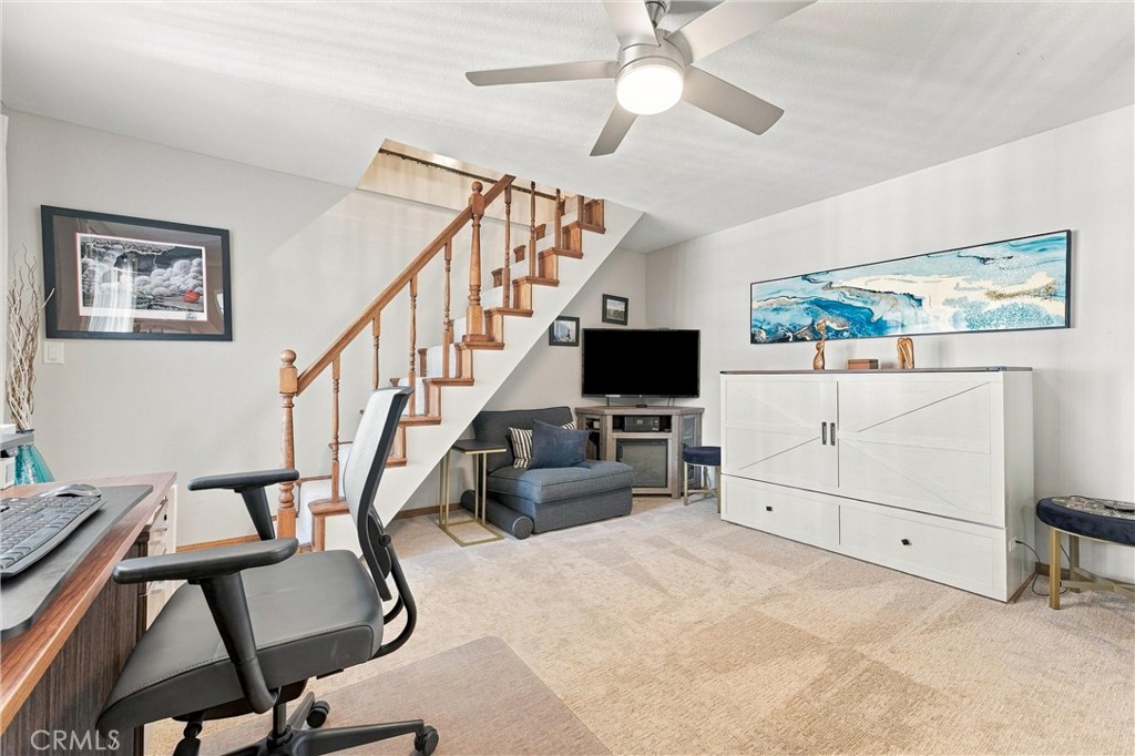 Secondary bedroom with stairs to loft - 5049 E Almond Avenue 4, Orange CA 92869 - photo 21