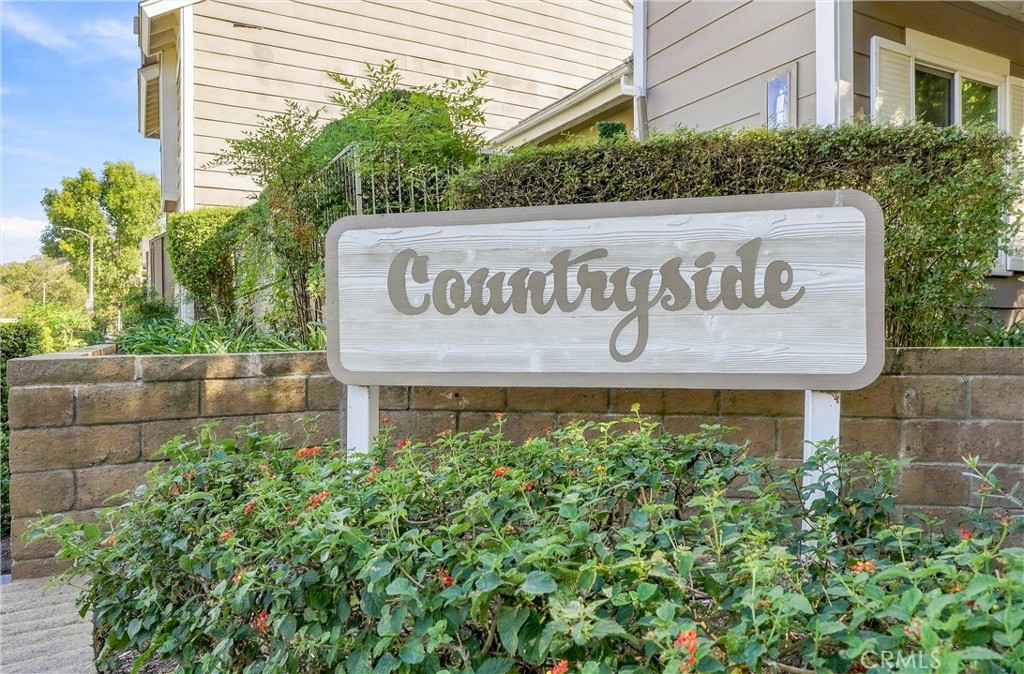 Residents of Countryside enjoy access to a community pool and spa, along with beautifully maintained common areas. - 5049 E Almond Avenue 4, Orange CA 92869 - photo 43