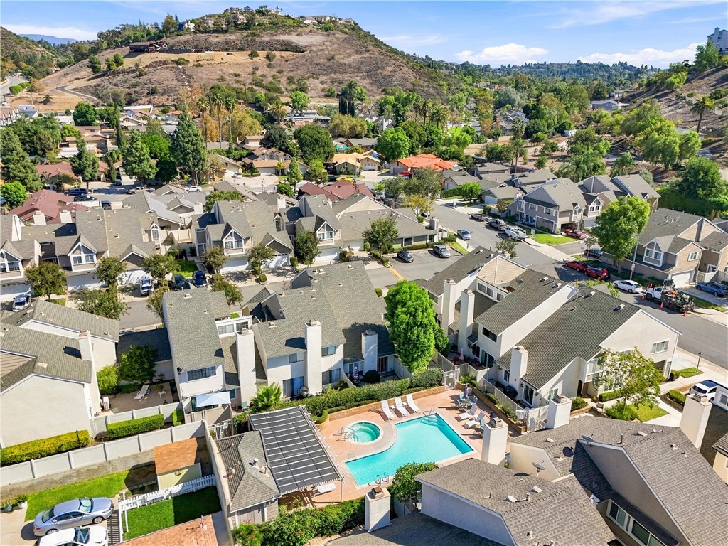 Residents of Countryside enjoy access to a community pool and spa, along with beautifully maintained common areas. - 5049 E Almond Avenue 4, Orange CA 92869 - photo 48