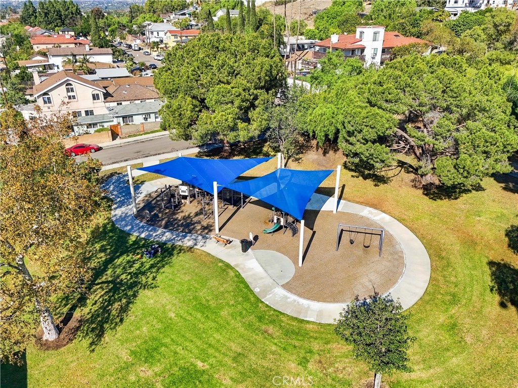 Just a 5-minute drive from the property, El Modena Park offers a wonderful outdoor escape with expansive green spaces, s - 5049 E Almond Avenue 4, Orange CA 92869 - photo 50