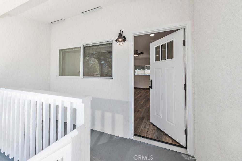 FRONT ENTRANCE WITH BALCONY PATIO - 557 N Olive Street D, Orange CA 92867 - photo 1