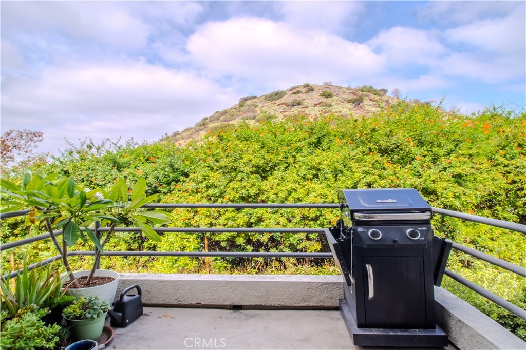 Patio Deck with View Of Hills - 5744 E Creekside 21, Orange CA 92869 - photo 17