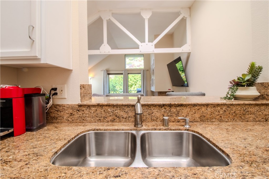 Kitchen Sink View through to Hills - 5744 E Creekside 21, Orange CA 92869 - photo 25