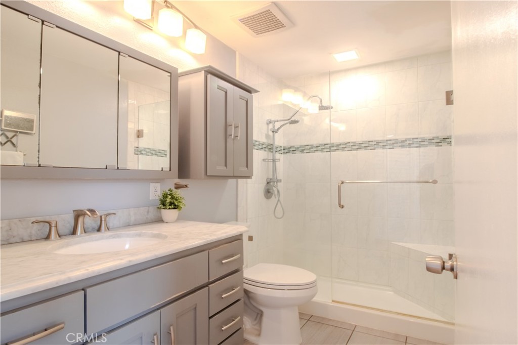 Bathroom with Tile Shower - 5744 E Creekside 21, Orange CA 92869 - photo 29