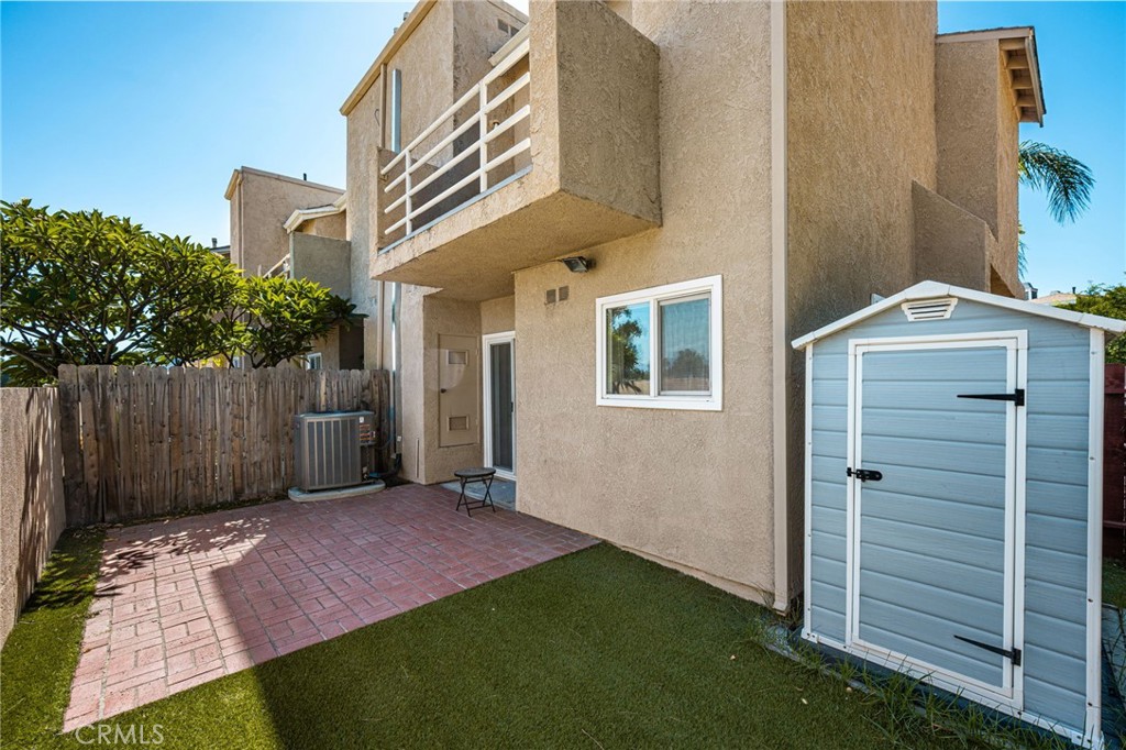 Patio with storage shed - 621 W Fletcher 24, Orange CA 92865 - photo 26