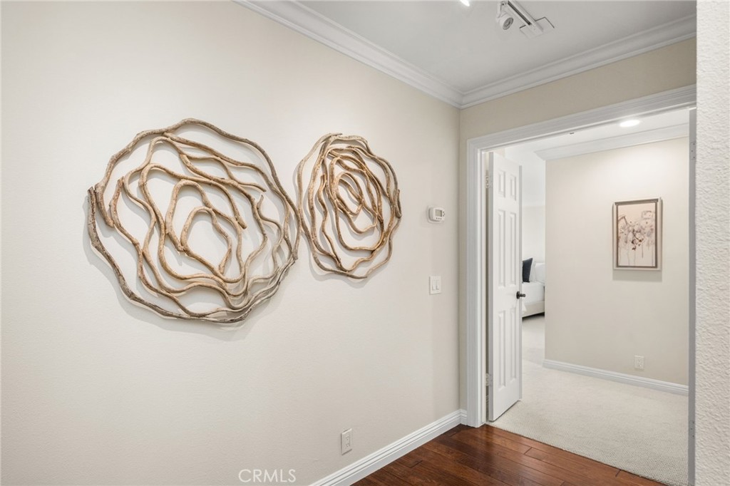 hallway into primary bedroom with double door entry - 6703 E La Cumbre, Orange CA 92869 - photo 40