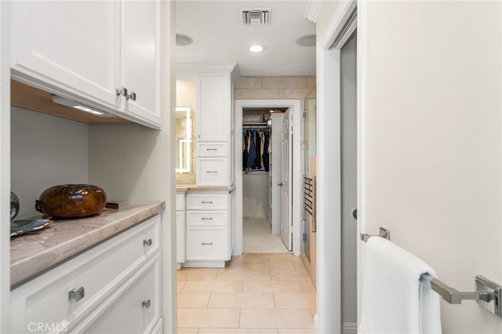 walk in closet #1 straight ahead, toilet room to the right, so much storage! - 6703 E La Cumbre, Orange CA 92869 - photo 44