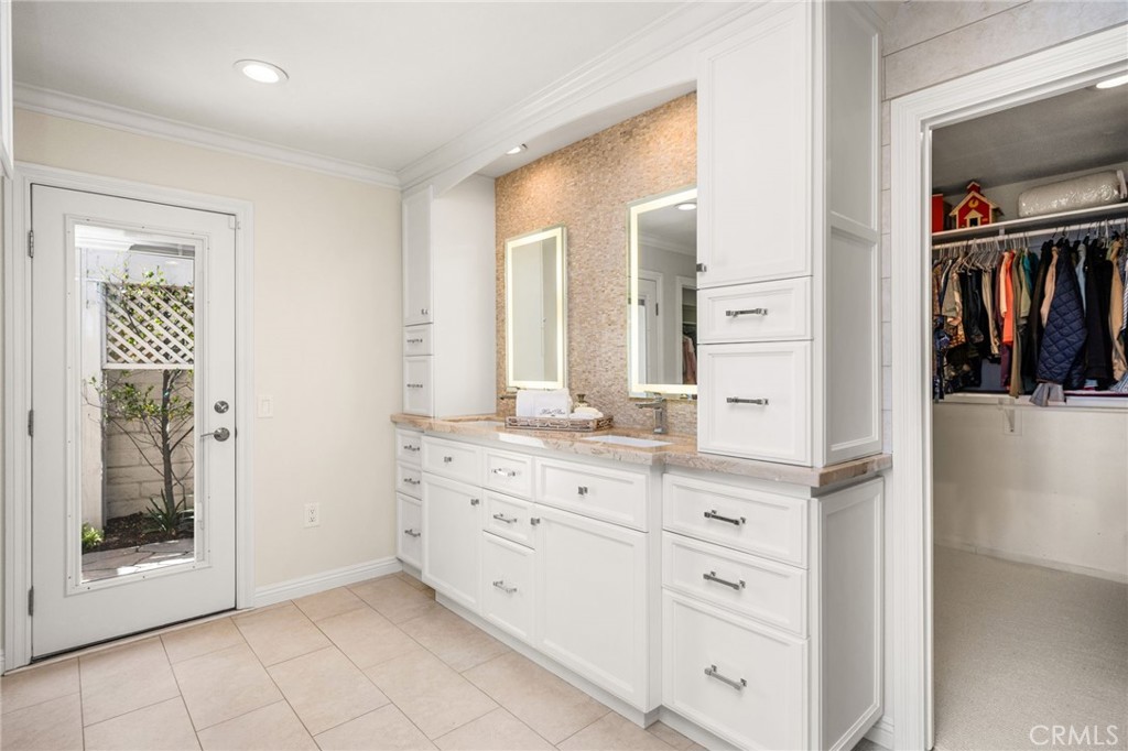 dual sink vanity with insta hot water, back lighted mirrors and great storage - 6703 E La Cumbre, Orange CA 92869 - photo 45