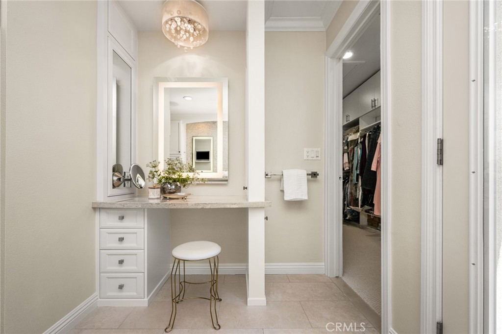 Vanity area in primary bath, door to walk in closet #2 - 6703 E La Cumbre, Orange CA 92869 - photo 49
