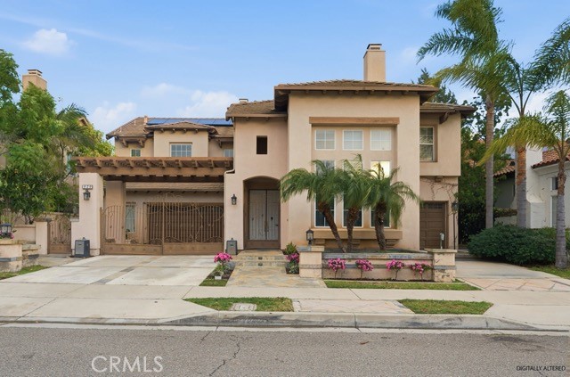 Two-car garage on the left and single-car garage on the right! Mediterranean aesthetic with grand entrance! - 979 N Antonio, Orange CA 92869 - photo 1