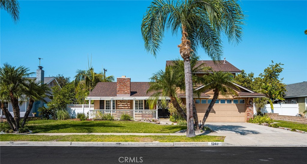 Charming and beautiful curb appeal. Perfect porch to relax and enjoy your day! - 1249 Bering Street, Placentia CA 92870 - photo 1