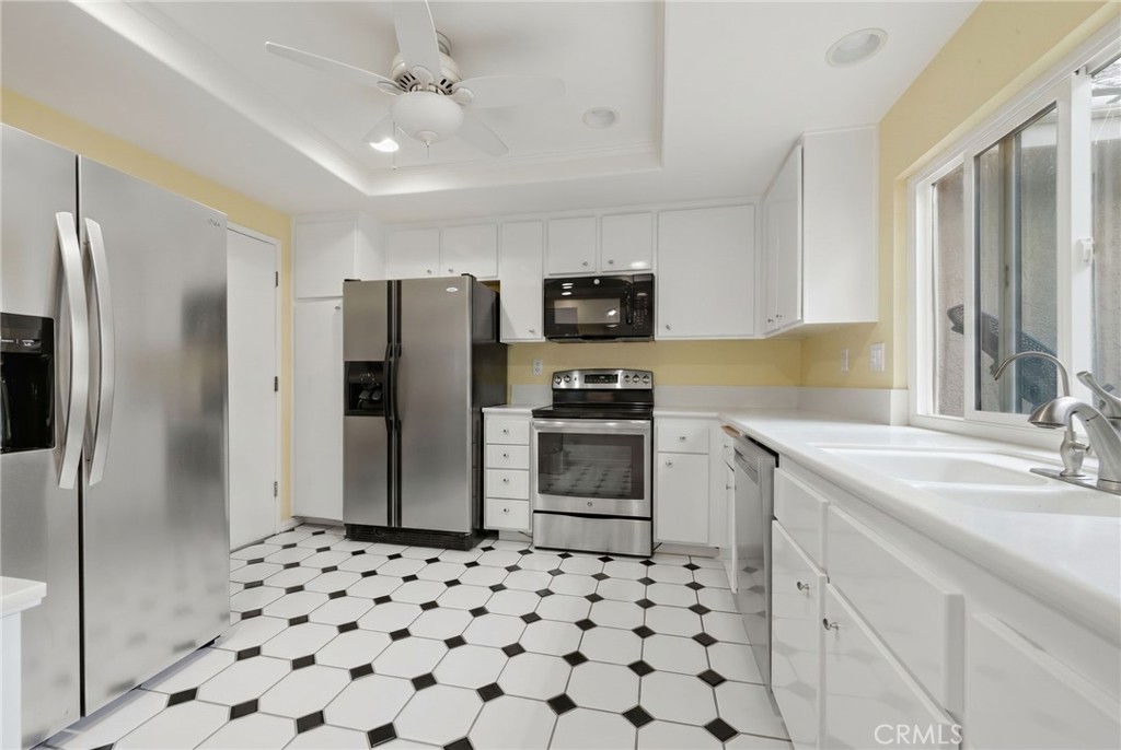 Kitchen has been painted white - 1260 Tiburon, Placentia CA 92870 - photo 10