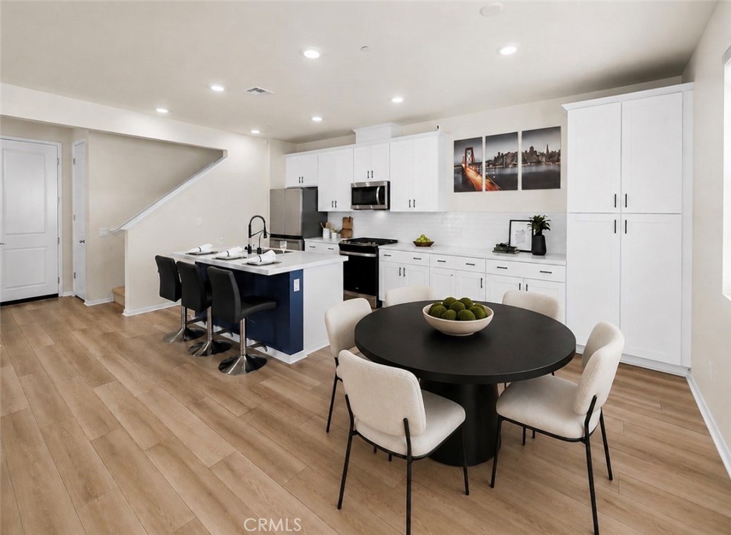 digitally added table - 1151 Whirlwind Drive, Rancho Mission Viejo CA 92694 - photo 7